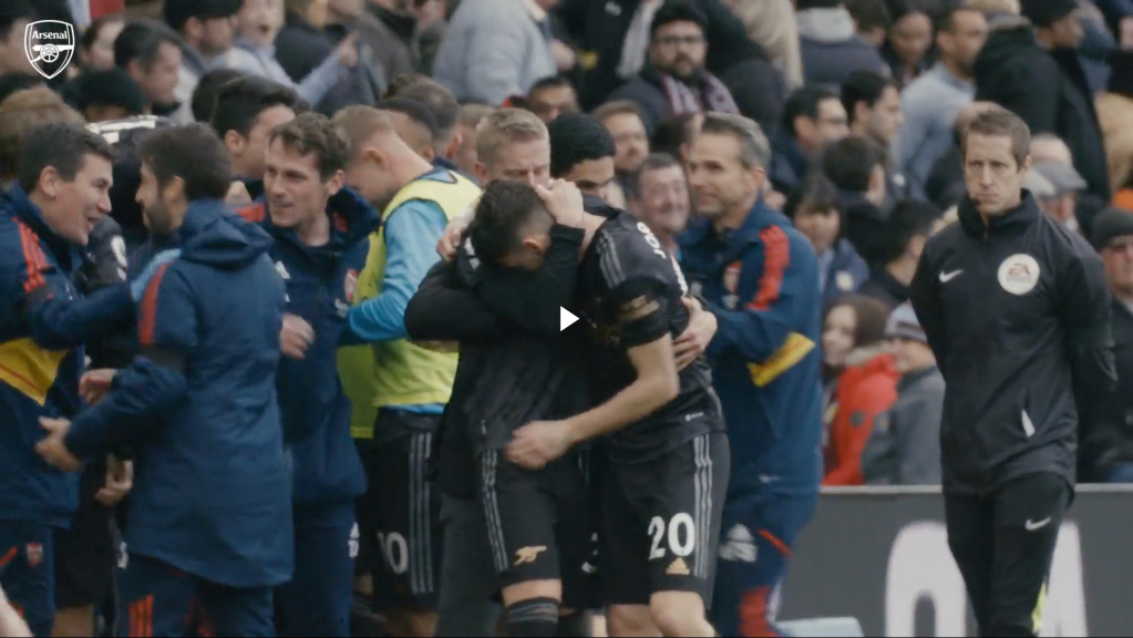Zincehnko hugs Jorginho in celebration after Martinelli's game-sealing goal.